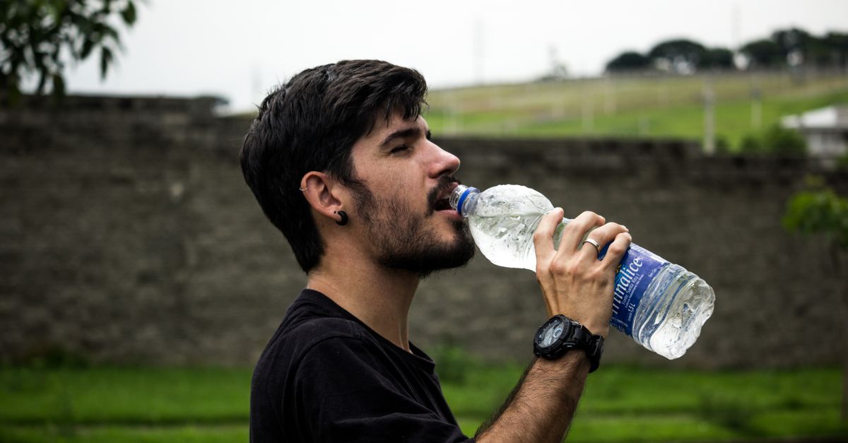 Glass of water and fresh food on a table