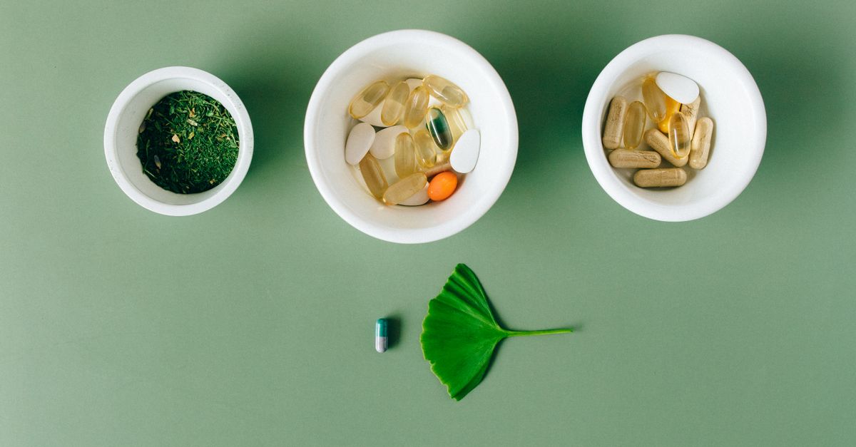 Herbal capsules and dried plant material in small ceramic bowls, the capsule form ephedra fat burners were sold in