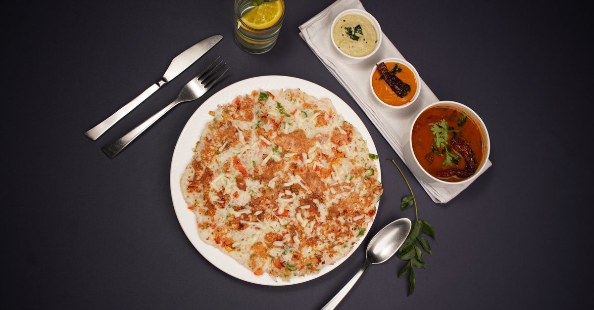 Savoury Indian rice breakfast with chutney bowls, a plate carrying far less free sugar than sweet cereal
