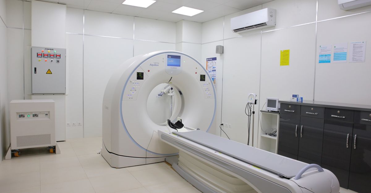 Empty hospital scanner in an imaging room, the kind of machine used for a PET scan of tumours
