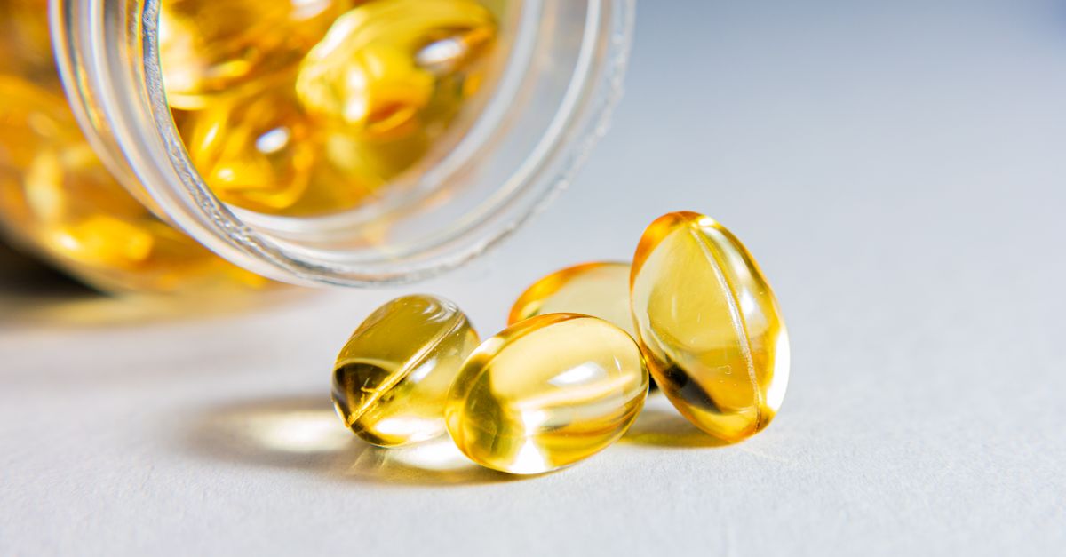 Transparent softgel capsules spilled from a glass jar, the usual first response to hair loss while dieting